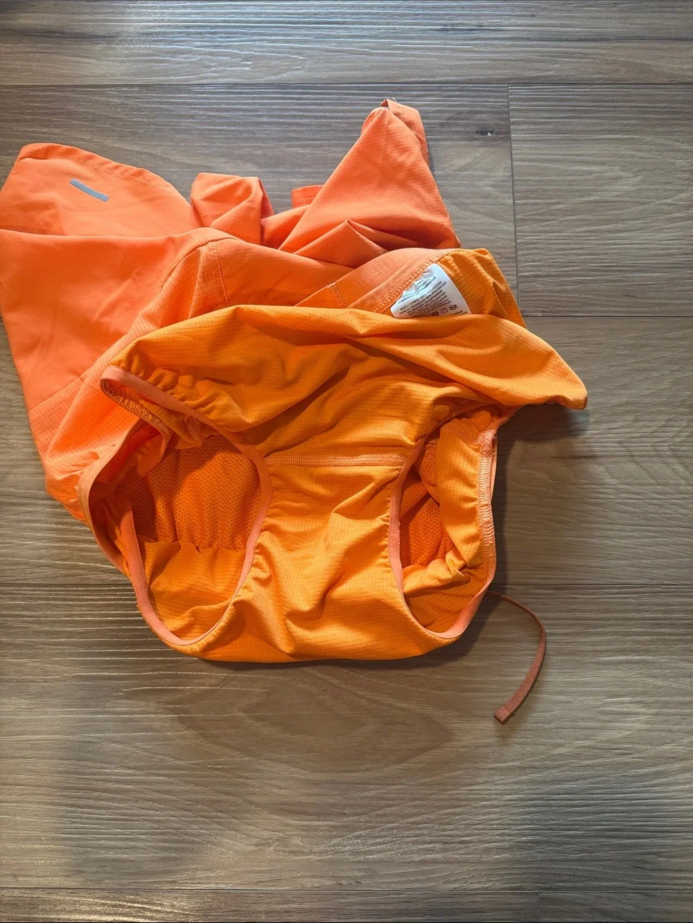 Nike Orange Athletic Running Shorts with Reflective Swoosh